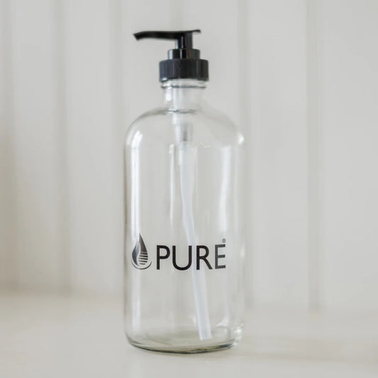 Bouteille distributrice en verre de 500ml avec pompe, de la marque PURE, pour le vrac.